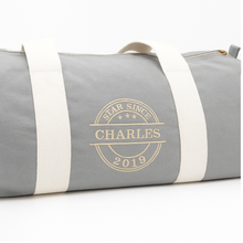 Load image into Gallery viewer, Personalised grey barrel bag with embroidered name – Star Since design