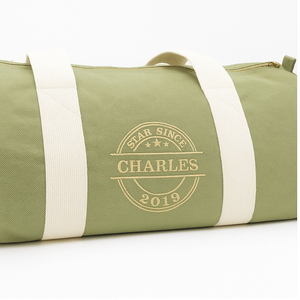 Personalised olive green barrel bag with embroidered name – Star Since design